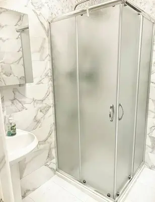 a shower stall in a bathroom with a sink at Sam Villa in Ulcinj
