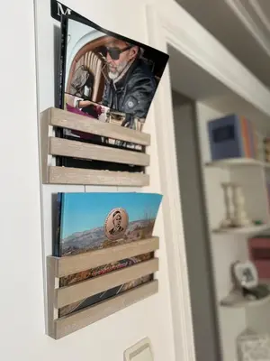a picture of a man hanging on a door at Apartman Na pjenu od mora Becici in Budva