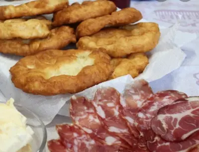 a bunch of food sitting on top of a table at Villa Natalija in Podgorica