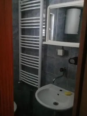a bathroom with a sink and a mirror at Villa Natalija in Podgorica