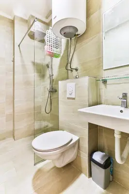 a bathroom with a toilet and a sink at Sonja Apartment in Budva