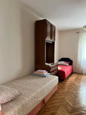 a room with two beds in a room at Gorica hill apartment in Podgorica