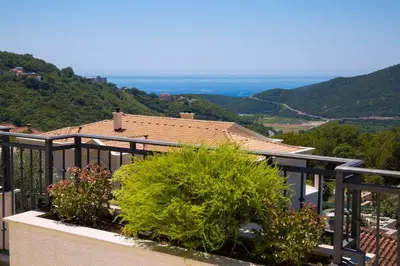 a balcony with a view of a house at Villa Gradina in Budva