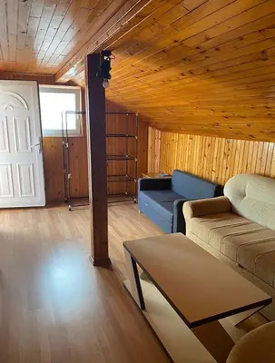 a living room with a couch and a table at Sun-Love in Sutomore