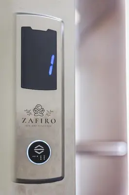 a close up of a remote control in a refrigerator at ZAFIRO SPA & RESIDENCE in Budva