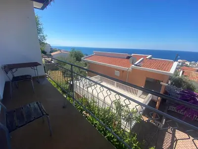 a balcony of a house with a view of the ocean at Apartman Elena in Ulcinj