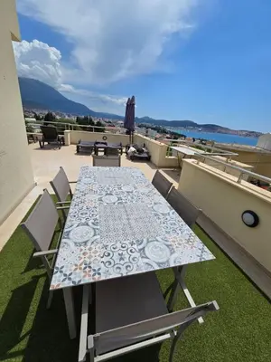 a table and chairs on a balcony with a view at Vila Federica in Bar