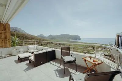 a balcony with a view of the ocean at Mahakala Center in Petrovac na Moru