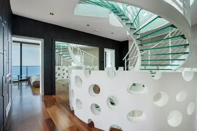a house with white walls and a glass ceiling at Villa Harizma in Budva