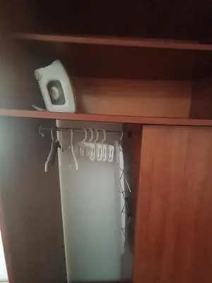 a wooden cabinet with a shelf with a cupboardigunigunigunigunigunigun at Vesela vila in Sutomore