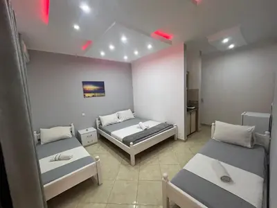 a room with two beds in a room at K&K Apartments 1 in Ulcinj