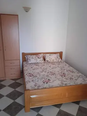 a bedroom with a bed in a room at Daco22 in Becici