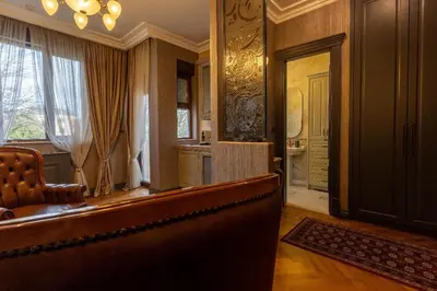 a court room with a bench and a window at Downtown Residence in Podgorica