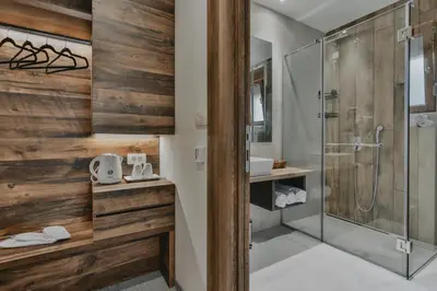a bathroom with a shower and a sink at Hotel Vladimir in Budva