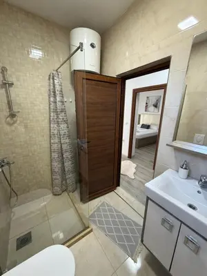 a bathroom with a shower and a sink at Apartments Amar in Ulcinj