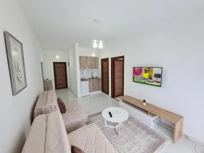 a living room with a couch and a table at Apartments Amar in Ulcinj