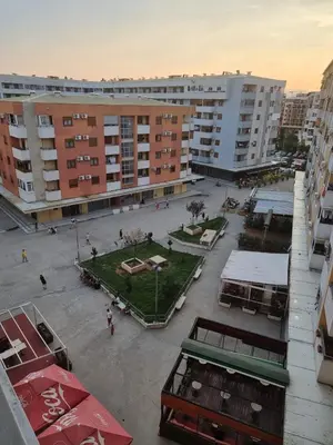 a view of a courtyard in a city with buildings at 5 star apartment in Podgorica