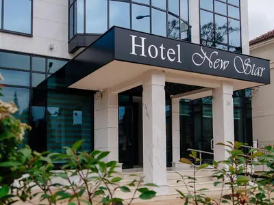 a hotel sign on the front of a building at Hotel New Star in Podgorica