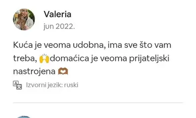a screenshot of a text message of a woman complaining about a pizza at Stone house Djakonovic in Budva