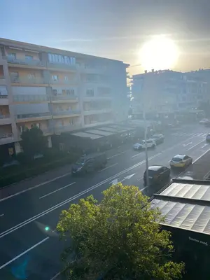 a view of a city street with cars on the road at Apartment City Kvart Podgorica in Podgorica