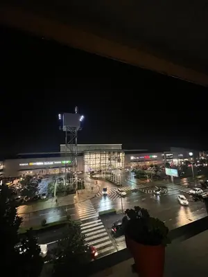 a view of a parking lot at night at Apartment City Kvart Podgorica in Podgorica