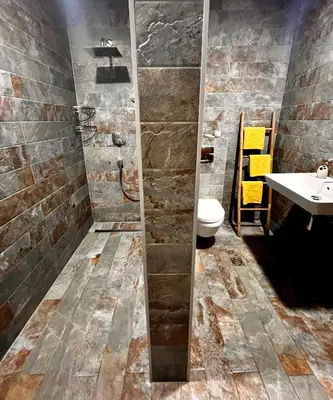 a bathroom with a sink and a toilet at Beach Villa Žukovica in Radanovići