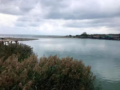 a view of a large body of water with houses at Masa L13 Stasa L14 in Ulcinj