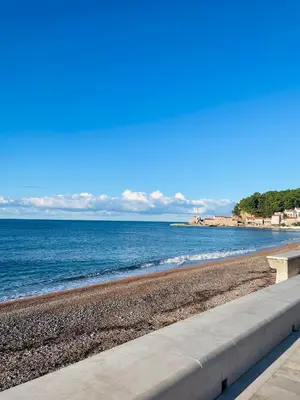 a view of a beach with the ocean at Просторная квартира в Петровце с видом на море in Petrovac na Moru