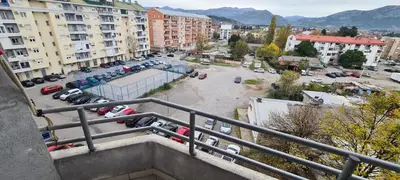 a view from a balcony of a parking lot at Apartman Velimir Stari Aerodrom in Svijetin Brijeg