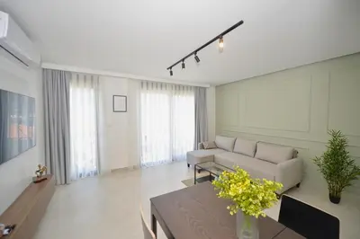 a living room with a couch and a table at Solaris Lux Apartments in Kotor