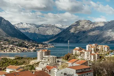 a view of a city and a lake and mountains at LANA Sea View Apartment in Kotor