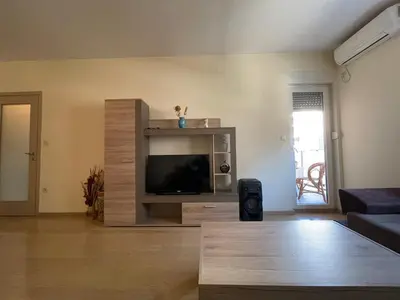 a living room with a flat screen tv at Apartment CK in Podgorica