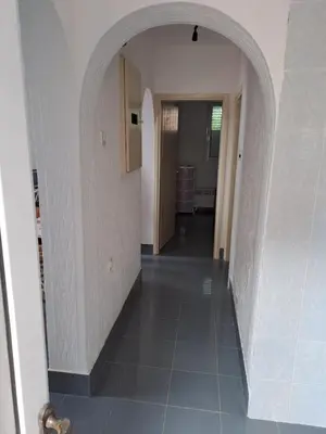 a hallway with an archway in a house at Villa Peonia in Sutomore