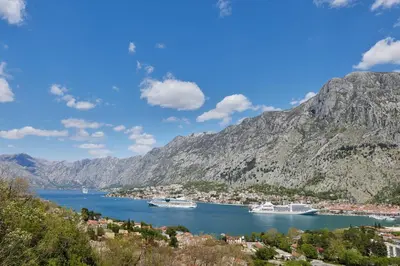 a view of a bay with boats in the water at Huge Apartment with Stunning View and Sauna in Kotor