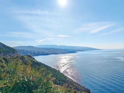a view of the ocean from a hill at Mialex apartments in Dobra Voda