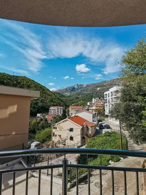 a view of a city from a balcony at Sunny apartment in Becici