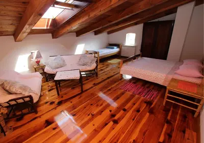 an overhead view of a living room with wooden floors at STONE HOUSE “MEDITERRANEO” in Bar