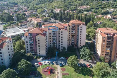 an aerial view of a city with buildings at The view of Kotor - Sea & Old town view in Kotor