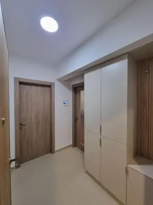 an empty room with two doors and a hallway at Master Quart modern apt. 27 in Podgorica