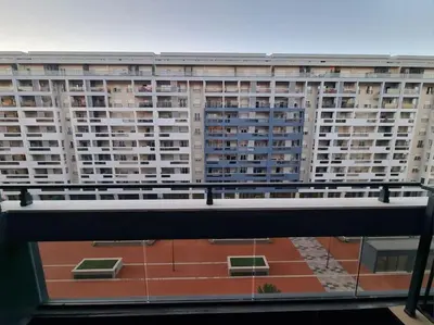 a view of a large apartment building from a balcony at Master Quart modern apt. 27 in Podgorica