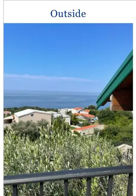 a view of the ocean from a house at Krnic Kottage Ratac-Sutomore-Bar-Montenegro in Sutomore