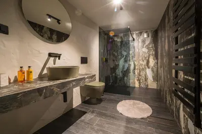 a bathroom with a sink and a toilet at Villa Di Campagna in Kotor