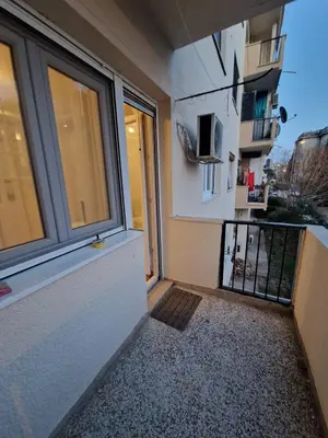 a balcony of a building with a window at Your place in Podgorica in Podgorica