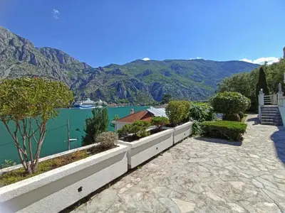 a view of a lake with mountains in the background at Apartment Kotor in Kotor