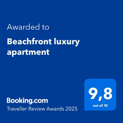 a blue sign with the text awarded to a benefit inventory appointment at Beachfront luxury apartment in Budva