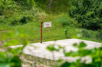 a basketball hoop in the middle of a field at Villa 177 in Tivat