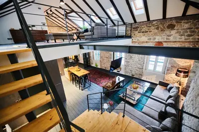 an overhead view of a living room and loft at The Old Town Luxury Apartment by Montenegro Moments in Kotor
