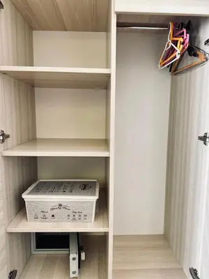 a walk in closet with a box in it at Vila Centar in Budva