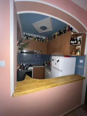 a kitchen with an archway in the middle of it at PA Max apartment in Kotor
