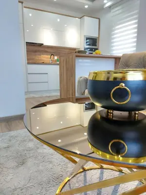 a glass table with a bowl on it in a kitchen at Long beach luxury Premium apartments in Ulcinj
